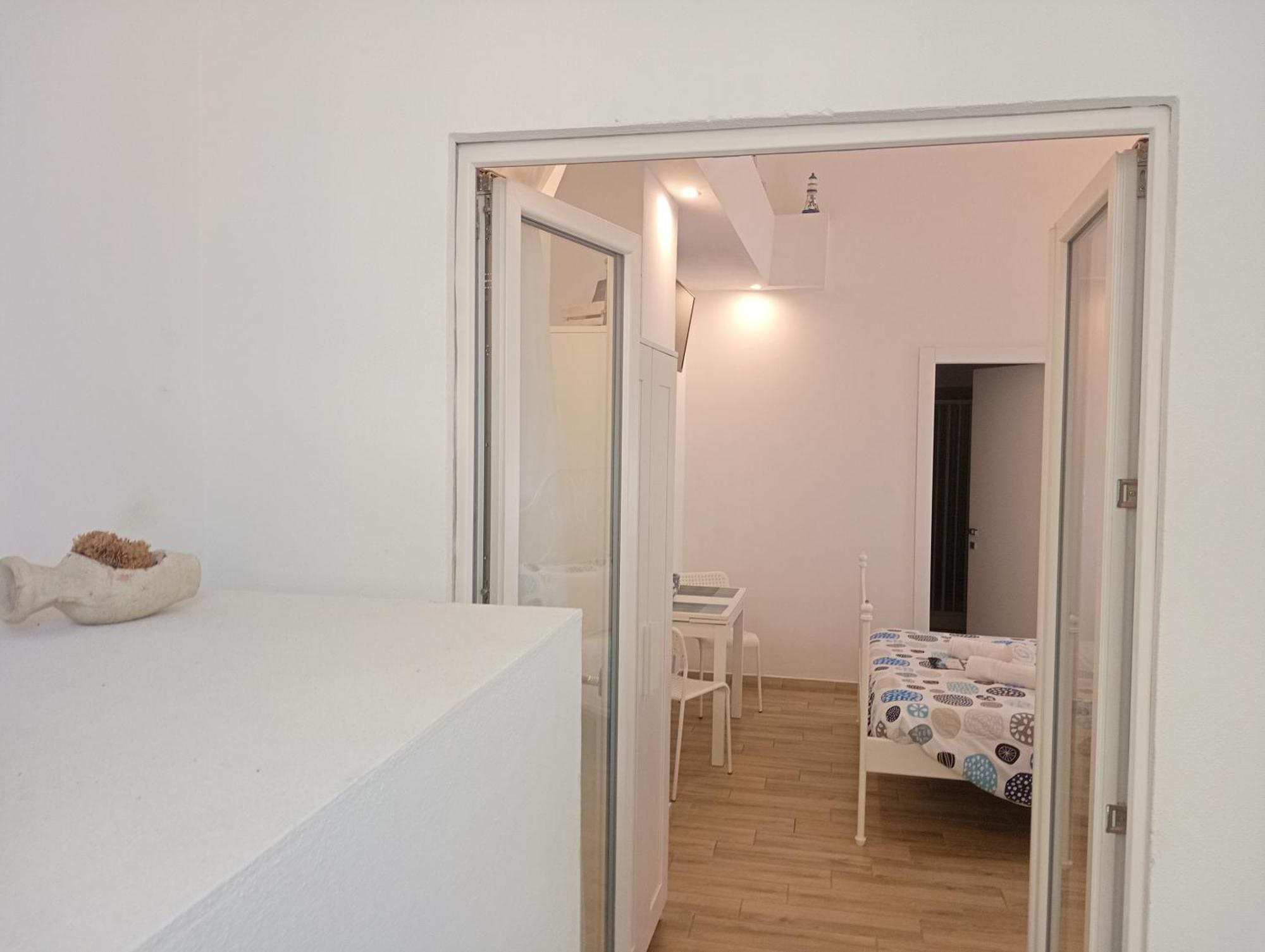 White Shell Rooms Accomodation Fast Check-In ألغيرو المظهر الخارجي الصورة